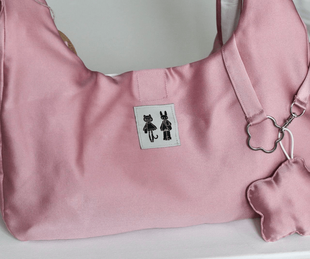 reversible shoulder bag and flower keychain