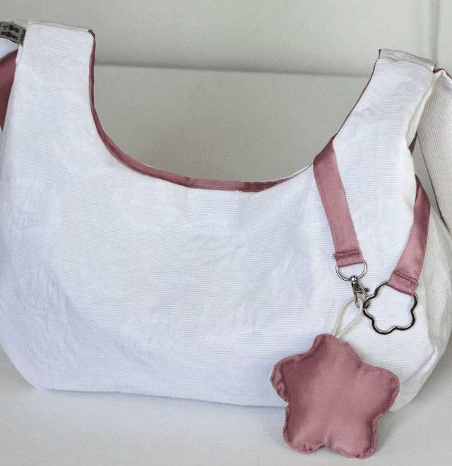 reversible shoulder bag and flower keychain
